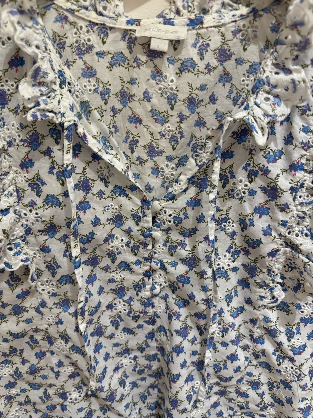 Ruffled V-Neck Sleeveless Blouse in Blue and White Floral - Picture 2 of 7